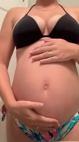 My pregnant tits won’t be able to fit in my old bathing suits much longer 😋