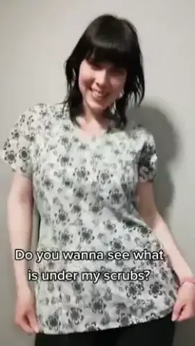 Wanna see whats under my scrubs ?