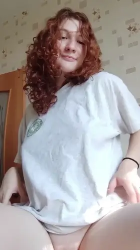 How about a redhead with natural boobs?