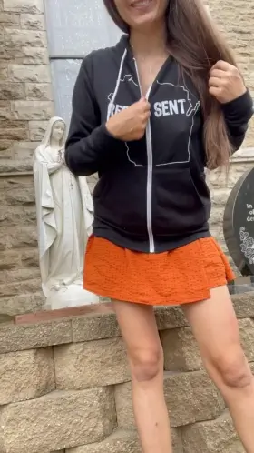 In front of the church bearing it all