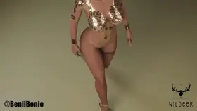 Lara Croft trying out her new outfit [Tomb Raider] (benjibonjo)