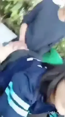 Cute specs girl bang from back by her school mate in garden