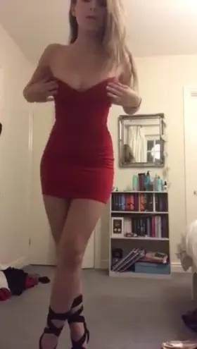 Who is she? blonde red dress strip