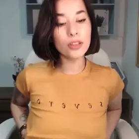 Revealing Her Pierced Nipples