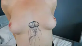 Redhead perky tits & fishnets