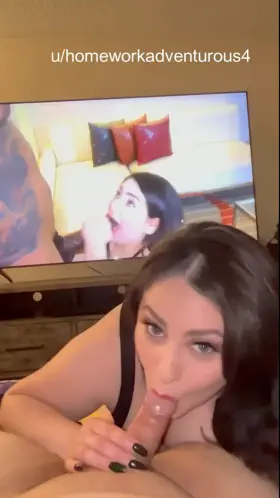 A nice take on this theme .... watching her play with a larger one on TV