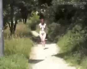 Tied up walking next to cars