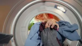 Helping stepmom with the laundry