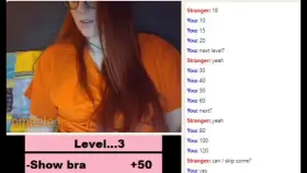 Sexy redhead flashing perky tits