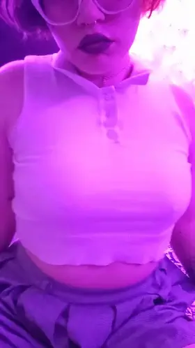 Dark makeup and light clothes make for artsy titty drops