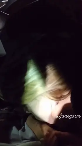 watching her suck him from the backseat