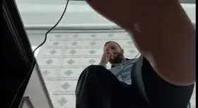 worship my feet under the desk.