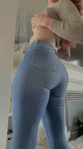 Redhead mum with a curvy bum. Pulling my pants down & giving you a show.