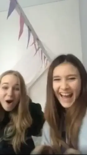 She was going to flash bra, but her friend took in one step further