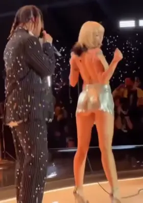 Fill in the blanks: Miley Cyrus transformed into a real ___ in just 10 years