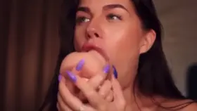 Gorgeous Girl Sucking a Toy