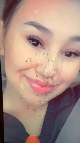 Giving Nicollette a 2nd coat of cum on her face