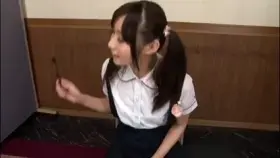 Student cleans her teeth