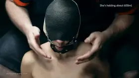 A hooded and gagged ADK couldn't hold her water. We tried strawberries and plugs, but nothing worked so she mopped it up herself (if you can't hear the audio in the app, I'll put a link to the RedGif original in the comments).