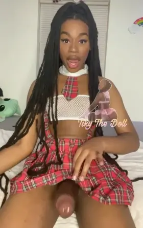 Tikythedoll revealing her colossal cock!