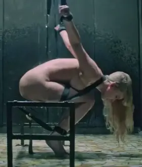 Jennifer Lawrence chained up in your basement because she is a spy for the enemy