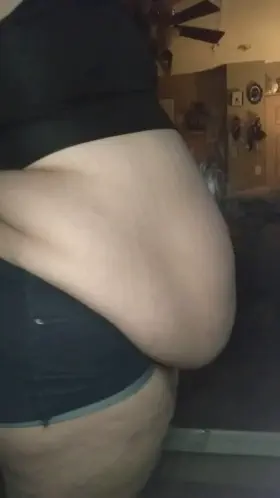 Showing my beautiful belly off from the side