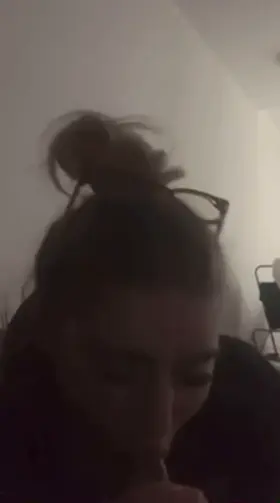 This slut loves having a black cock in her mouth