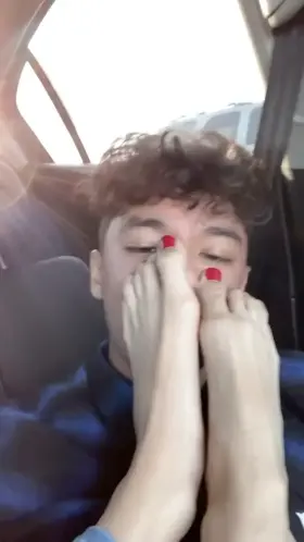 Another angle of long red toes scrunching her feet in my face, in Walmart parking lot