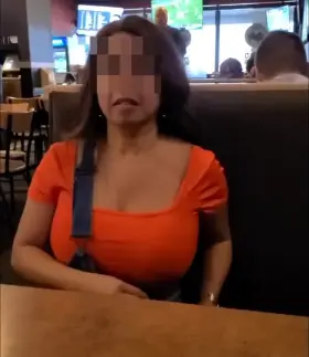 Indian wife having fun while waiting for food
