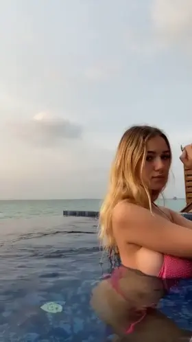 Big tits in the pool