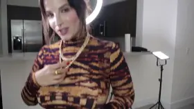 LaSirena69 showing her tits on a Podcast