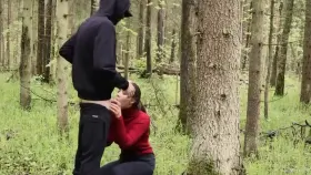 Hot brunette gives passionate blowjob outdoors