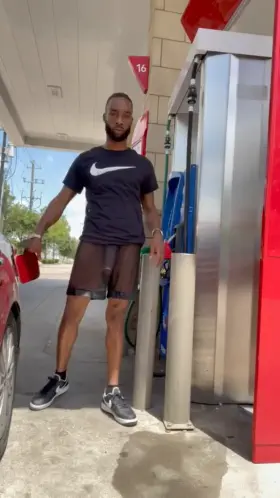 Standing in public with my see through shorts on pumping gas