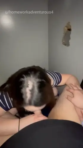 Sucking a stranger's thick cock at the gloryhole