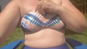 Just a MILF tit drop by the pool.