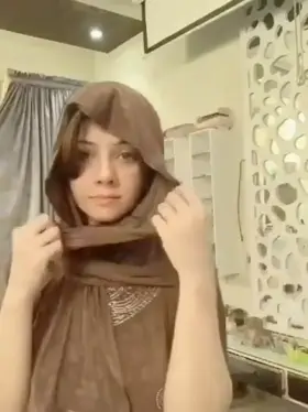 Innocent looking hijabi. Don't miss her slutry smile at end.