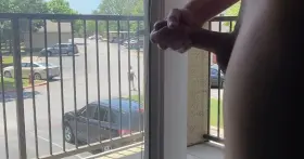 Blowing ounces of cum on the balcony, in full view!