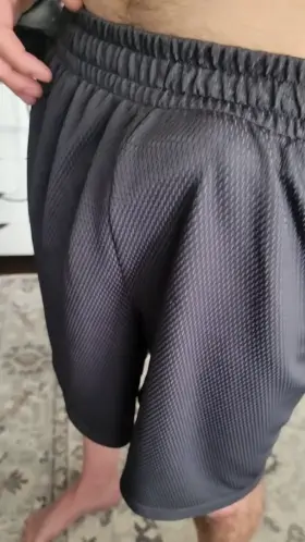 Pulling my shorts down in slow motion