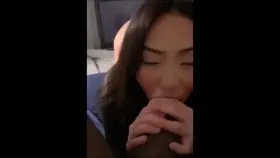 Asian girl sucking her boyfriend off