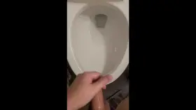 Spurting hard into the toilet