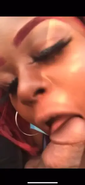 Black babe sucks Indian dick on Ferris wheel