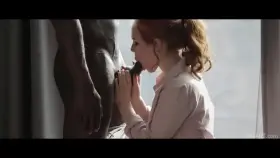 Sucking cock by the window