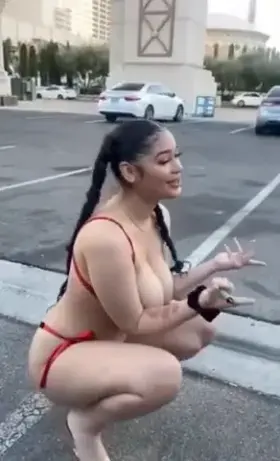 Sexy ebony in the parking lot