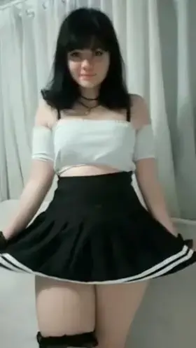 Anyone know who this goth babe is?