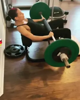 Zelina Vega showing off her big fake tits while working out