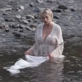 The busty Caroline Vreeland in a wet dress