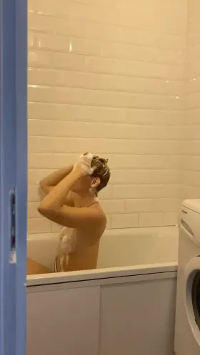 Taking a bath at the bathtub