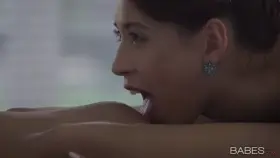 Exploring the mound with her tongue