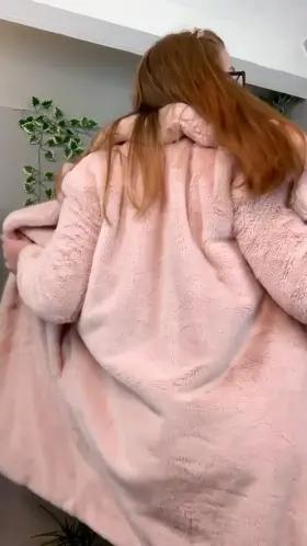 It’s a bit warm in here I’d better take off my coat [f]