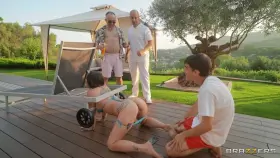 Anyone know who the girl on her knees is?